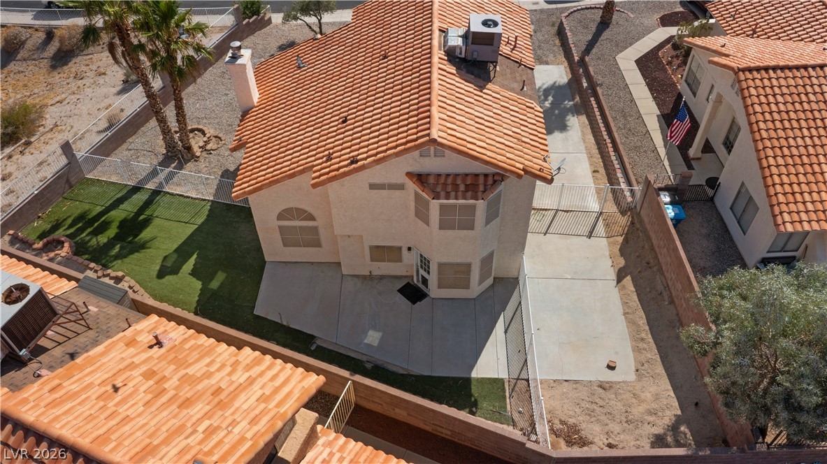 3156 Terrace View Drive Laughlin, NV 89029 - Photo 78 of 94 An aerial perspective reveals a private yard with a compact patio and fenced-in lawn space.