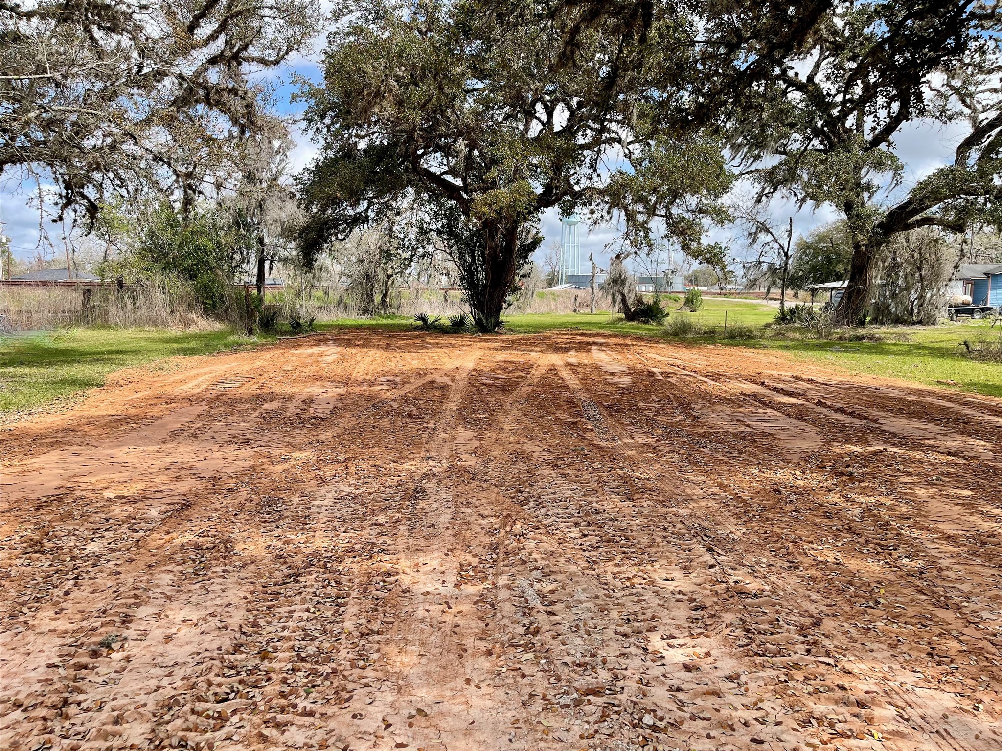 0 Travis Avenue Sweeny, TX 77480 - Photo 2 of 13 a view of yard with tree s
