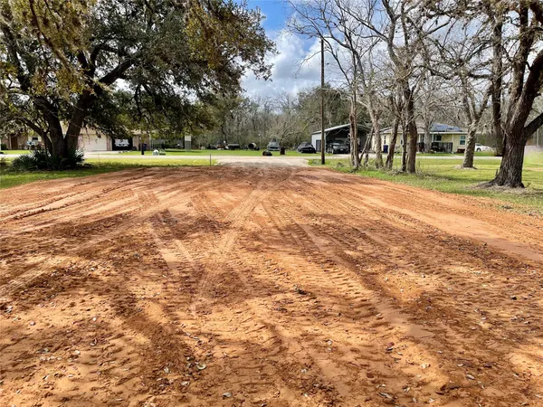 a view of outdoor space with deck and trees