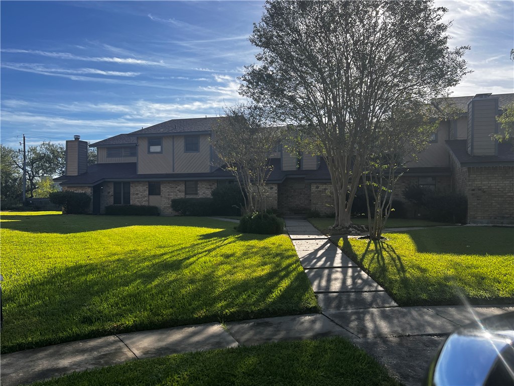 5180 Middlecoff Circle, Unit A Corpus Christi, TX 78413 - Photo 1 of 3 a view of swimming pool with a yard