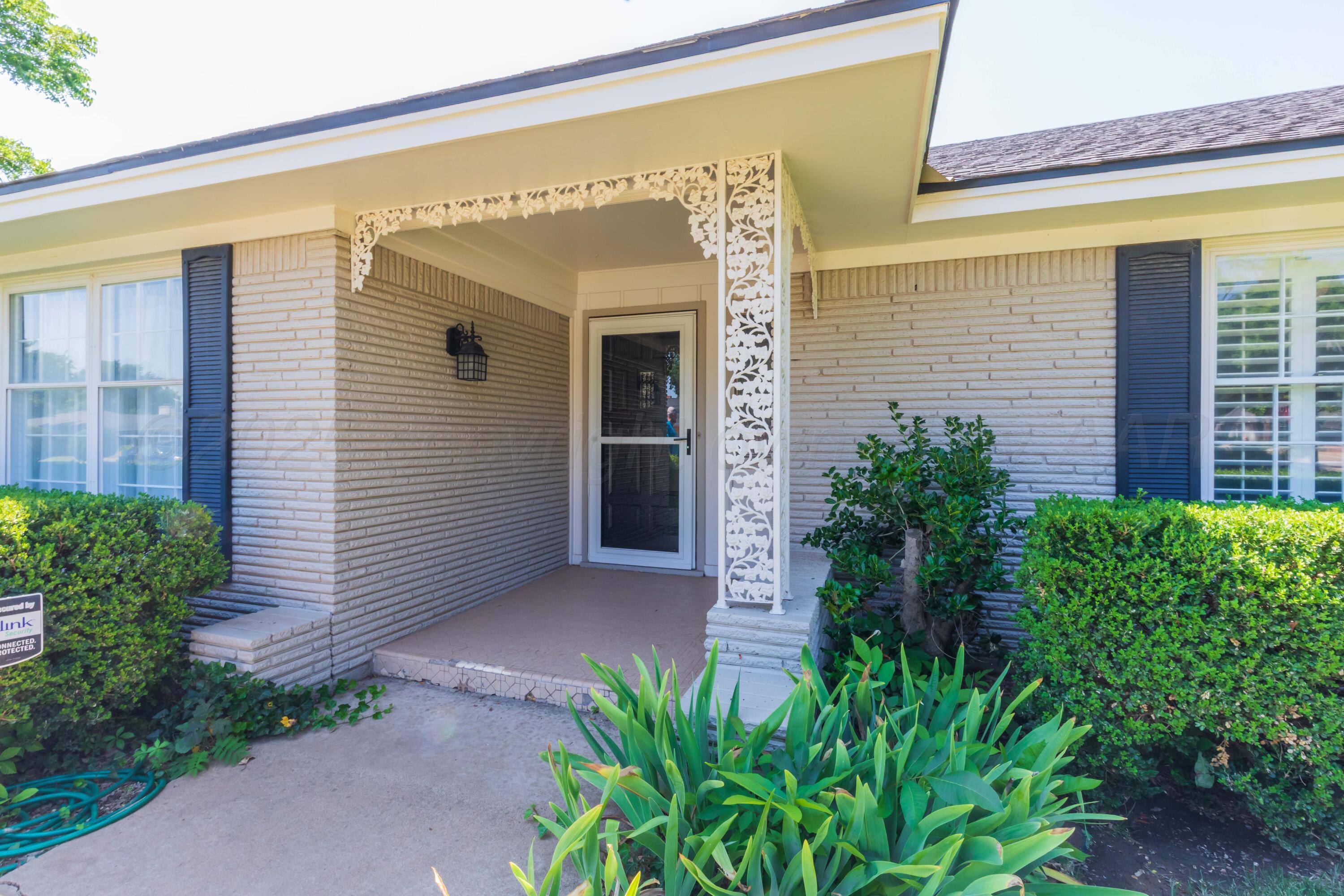 6019 Jameson Road Amarillo, TX 79106 - Photo 2 of 52 a front view of a house with plants