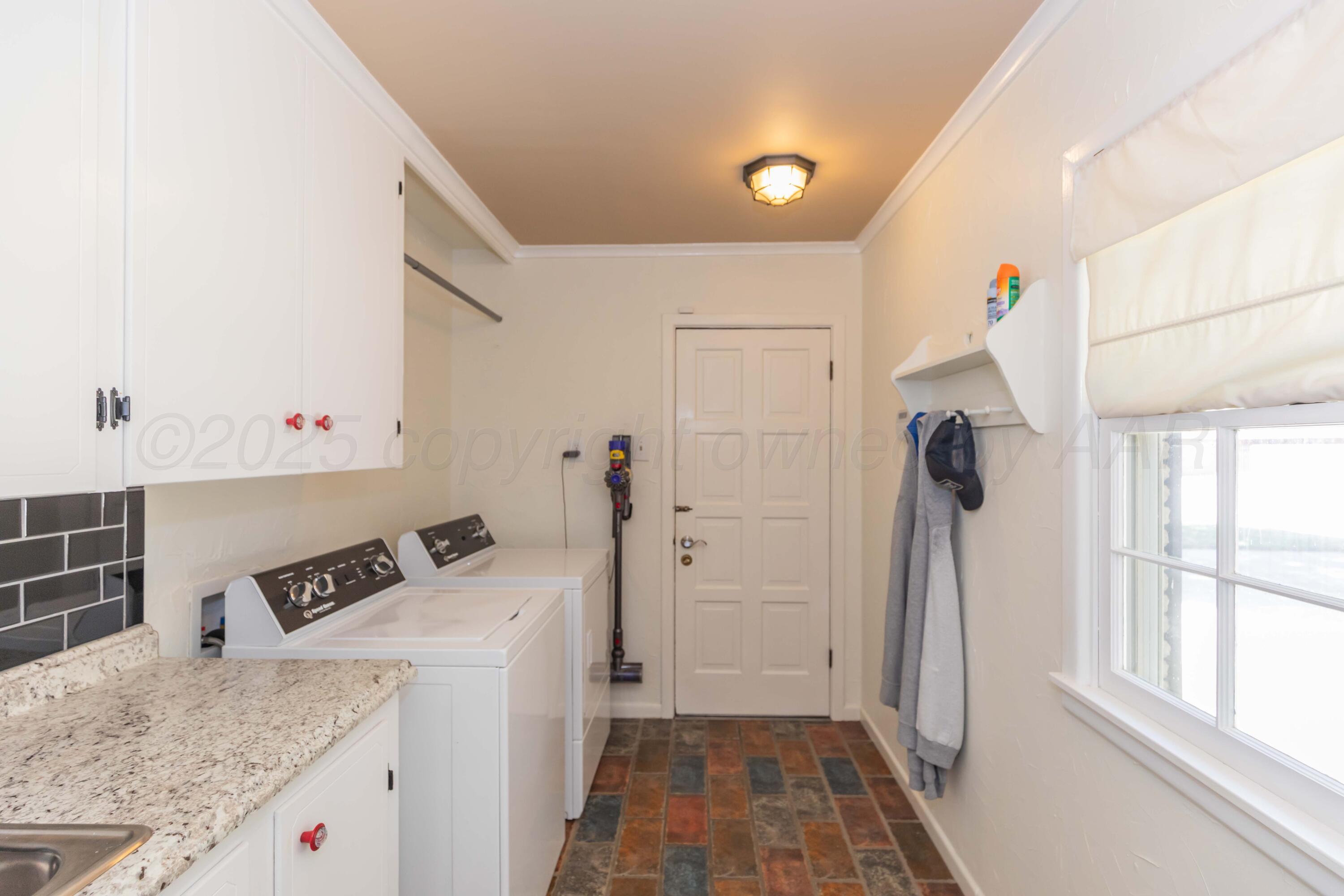 6019 Jameson Road Amarillo, TX 79106 - Photo 48 of 52 a view of a kitchen cabinets and a sink