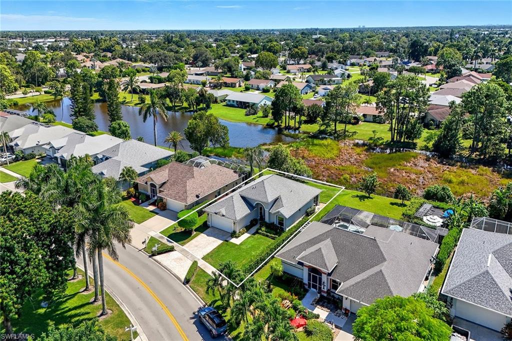 3688 Kent Drive Naples, FL 34112 - Photo 3 of 21 an aerial view of a house with a swimming pool