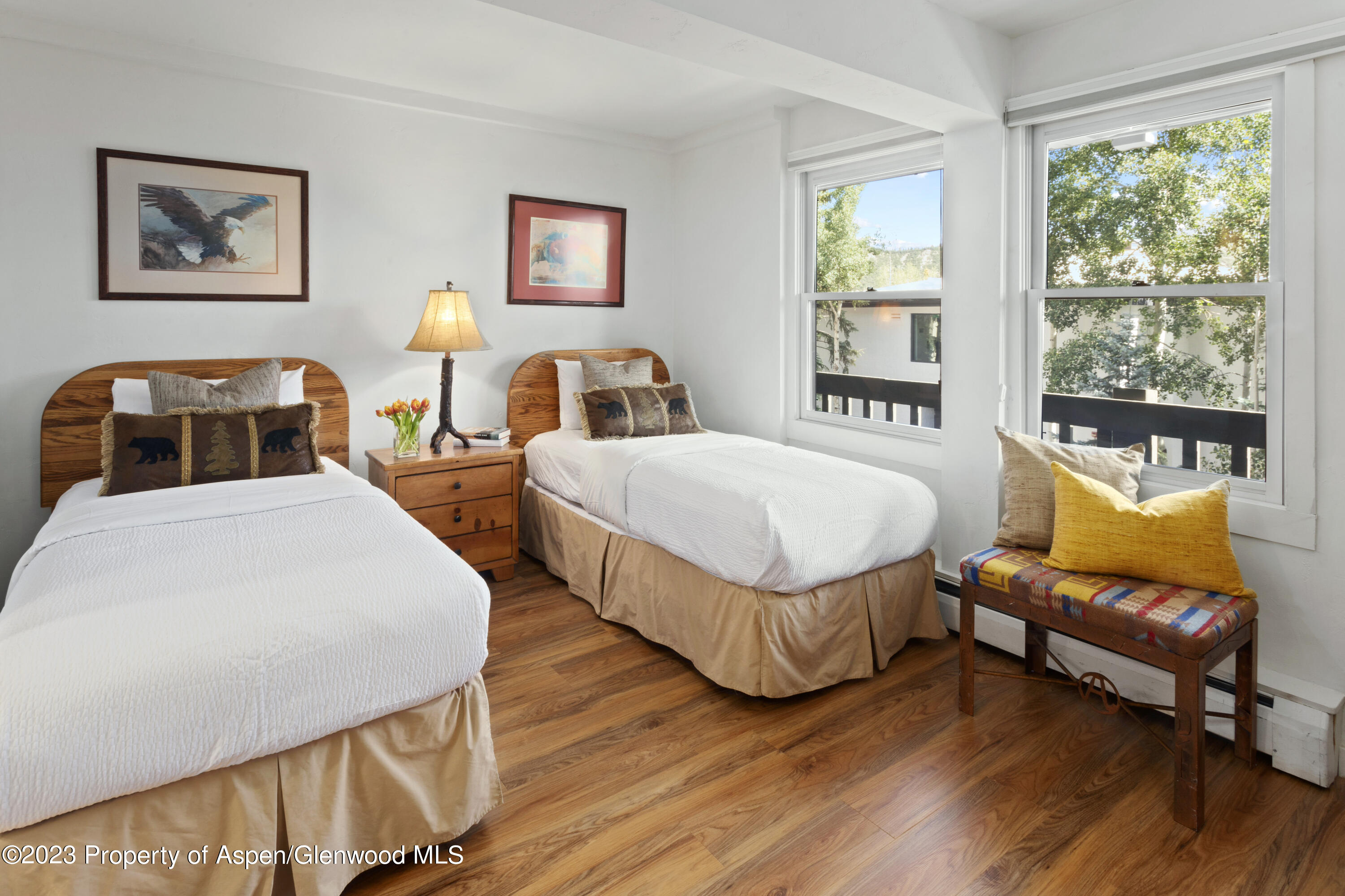Snowmass Village Snowmass Village, CO 81615 - Photo 12 of 23 a bedroom with two beds and a large window