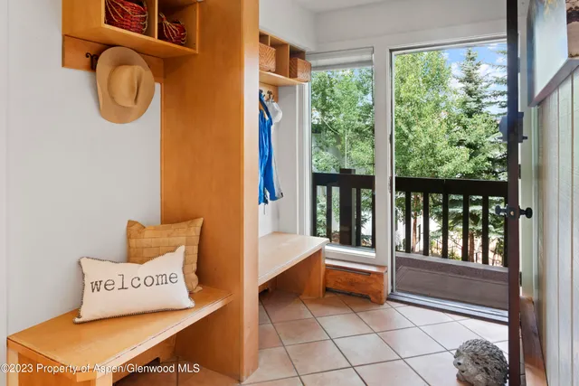 a view of an entryway with a rug
