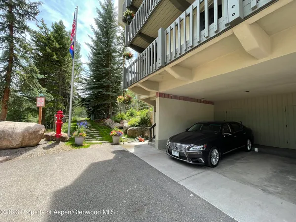 a car parked in front of a house