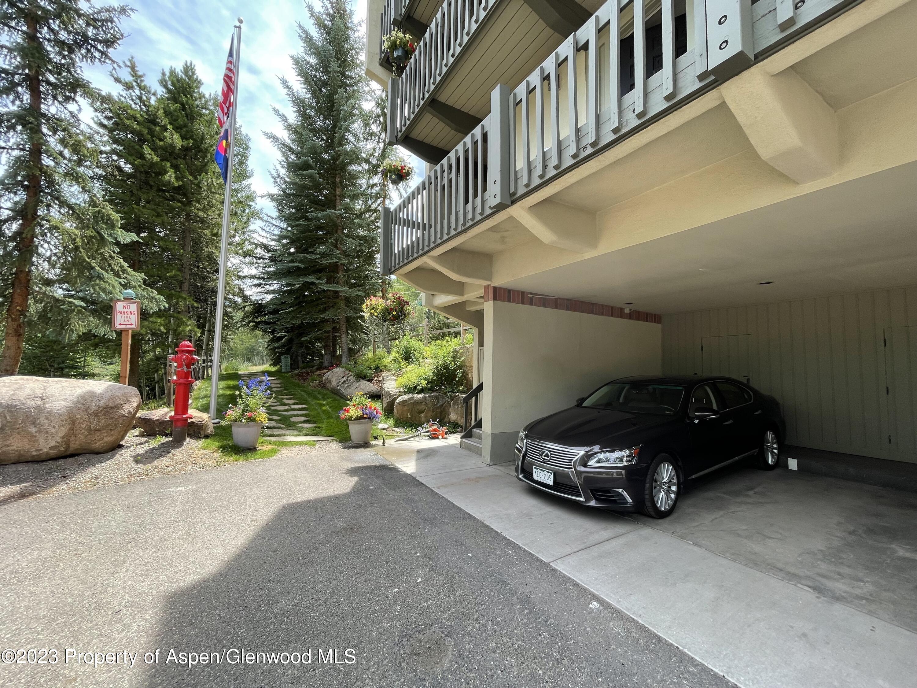 Snowmass Village Snowmass Village, CO 81615 - Photo 15 of 23 a car parked in front of a house