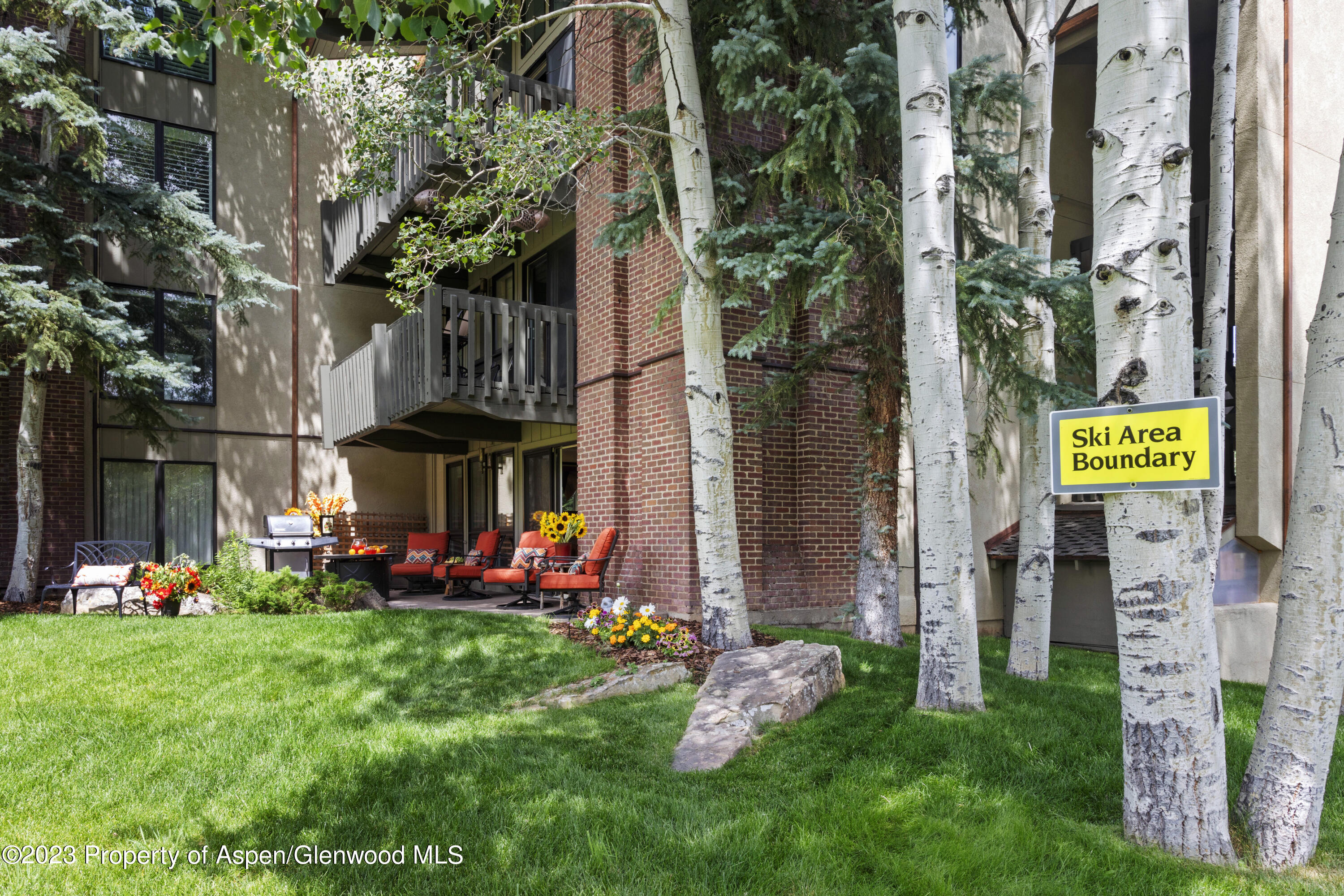 Snowmass Village Snowmass Village, CO 81615 - Photo 19 of 23 a front view of a house with garden
