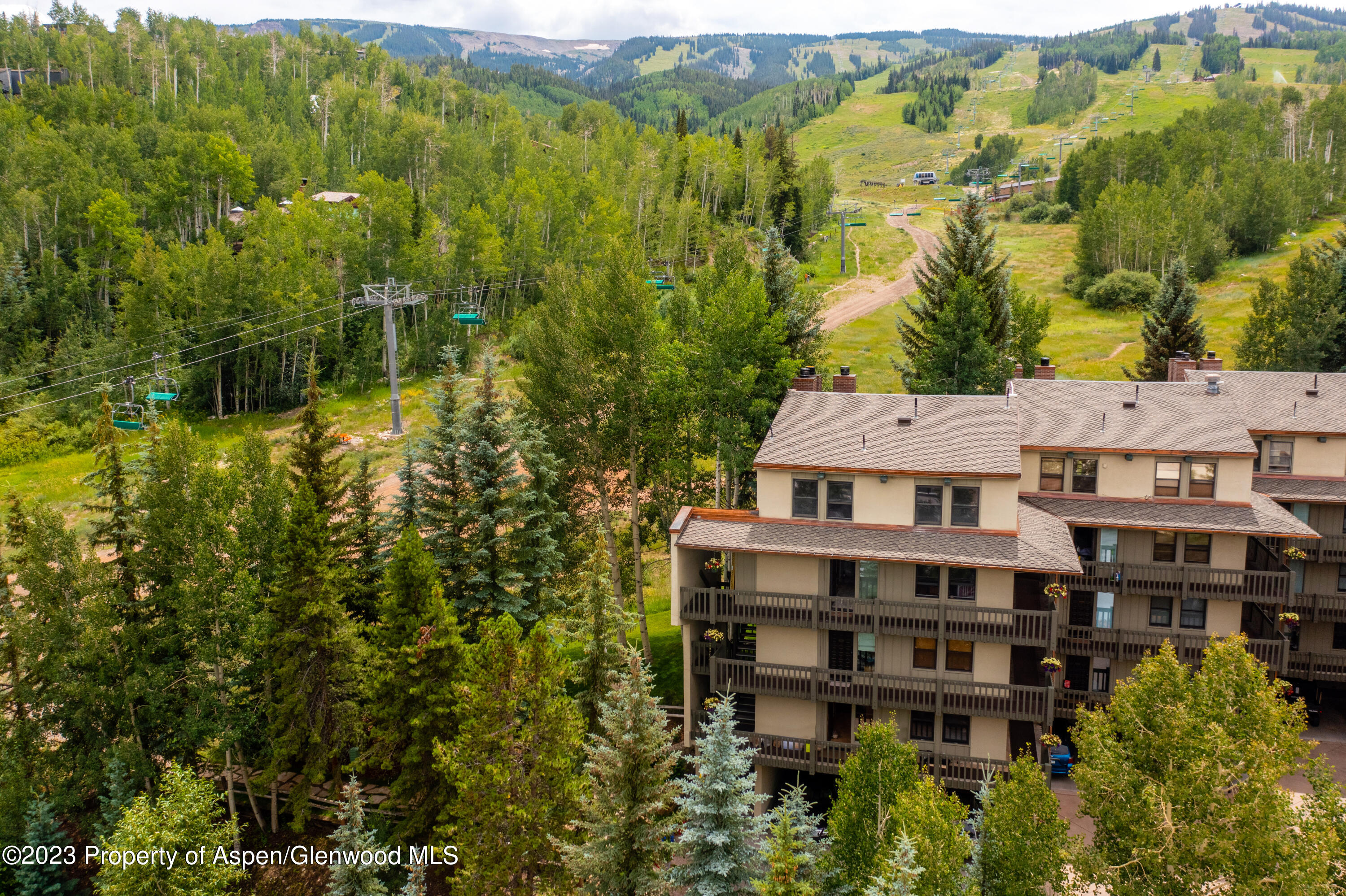 Snowmass Village Snowmass Village, CO 81615 - Photo 7 of 23 an aerial view of residential houses with outdoor space and trees