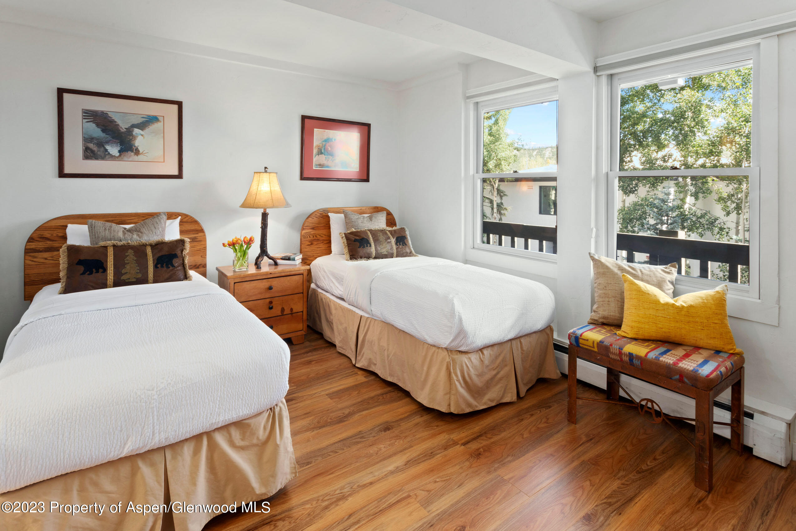 Snowmass Village Snowmass Village, CO 81615 - Photo 10 of 23 a bedroom with two beds and a large window