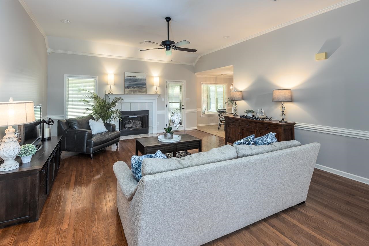 905 Grapevine Drive Collierville, TN 38017 - Photo 7 of 25 a living room with furniture and a fireplace