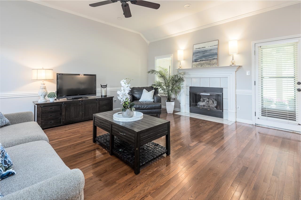 905 Grapevine Drive Collierville, TN 38017 - Photo 8 of 25 a living room with furniture and a fireplace or television