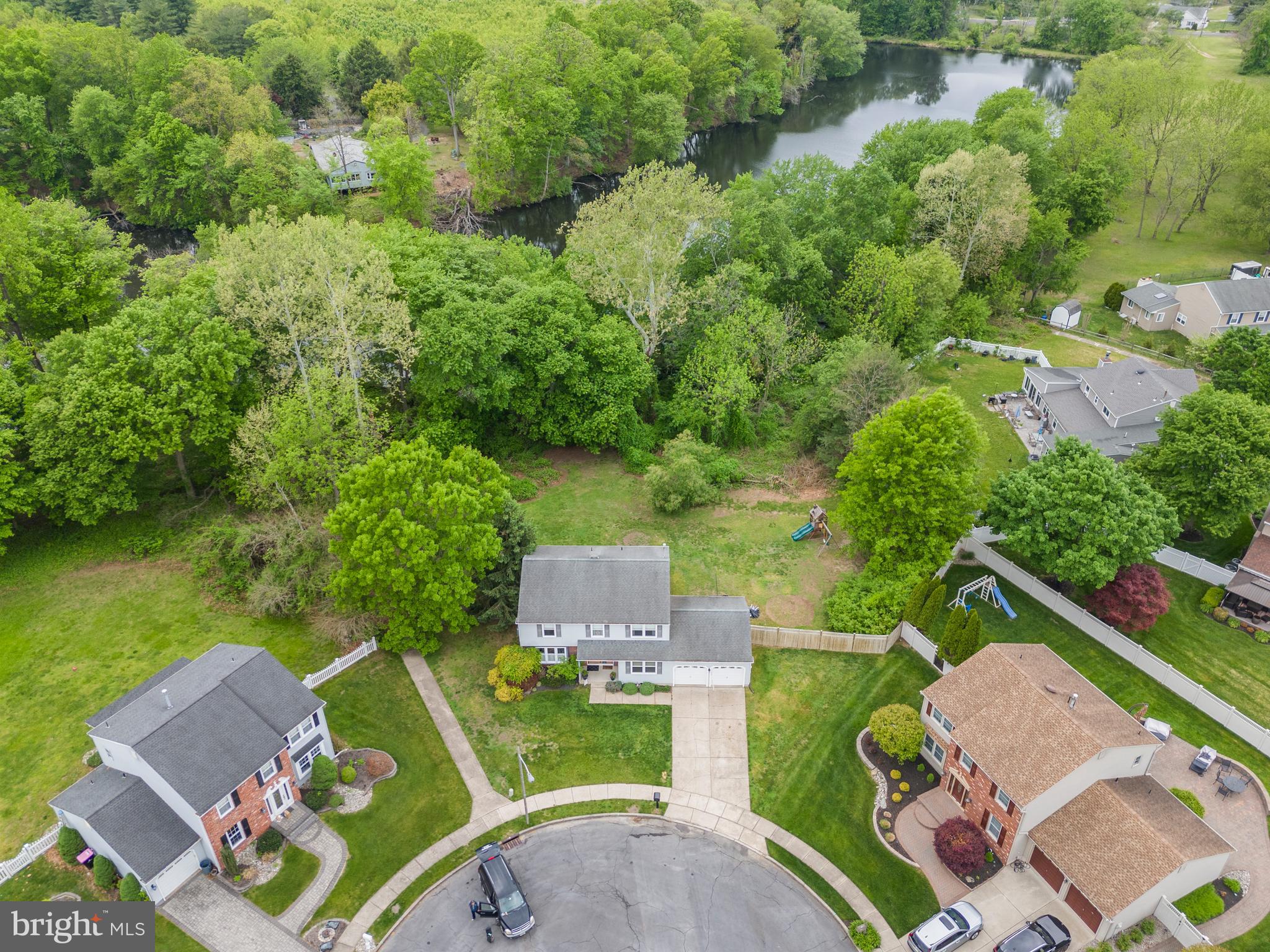 2 Farnham Court Laurel Springs, NJ 08021 - Photo 3 of 33 an aerial view of a house with outdoor space swimming pool and lake view