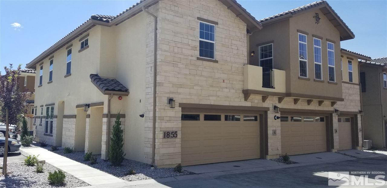 1855 Sea Horse Road, Unit C Reno, NV 89521 - Photo 1 of 1 a front view of a house with parking space