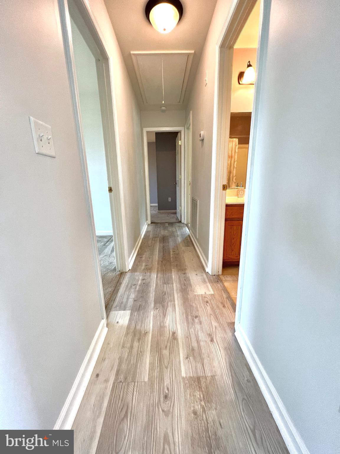 6567 Sharptown Road Laurel, DE 19956 - Photo 12 of 22 hallway leads to 3 bedrooms