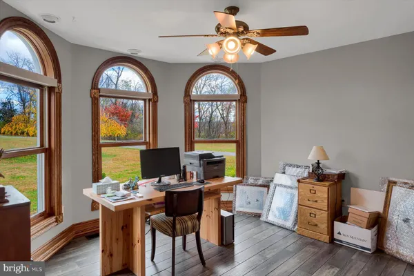 a room with furniture and wooden floor