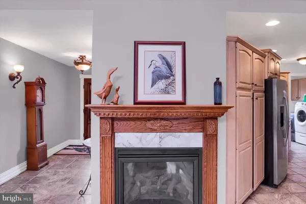 a stove top oven sitting inside of a kitchen