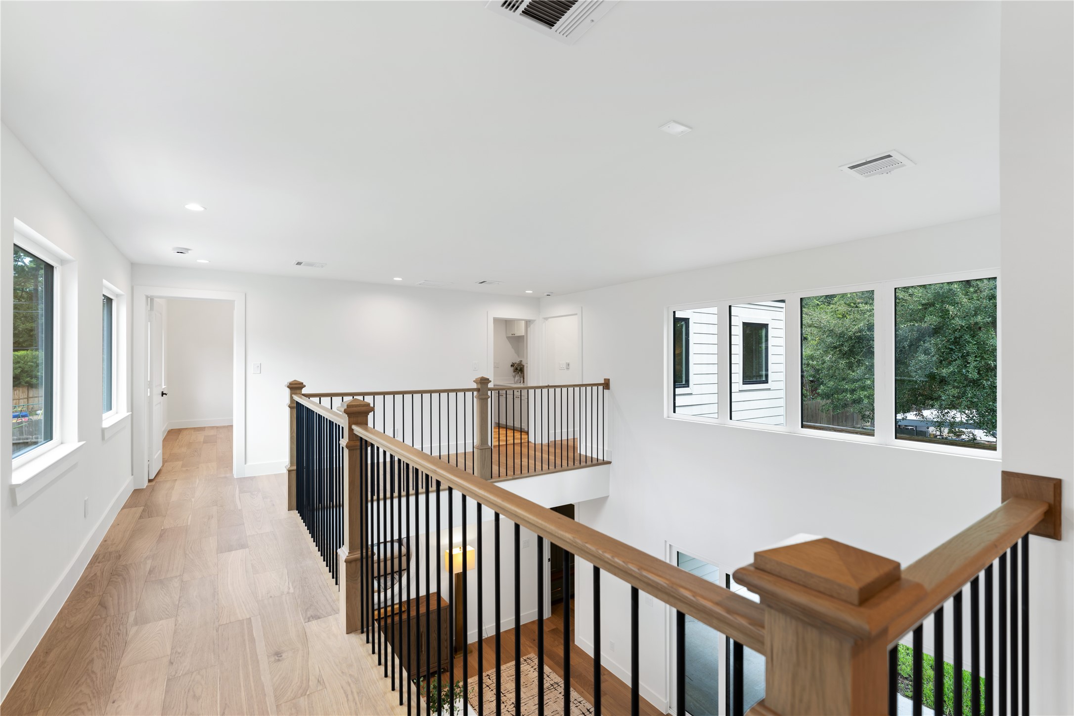 814 Azalea Street Houston, TX 77018 - Photo 11 of 31 Upstairs landing designed to maximize natural light and create seamless flow between living spaces