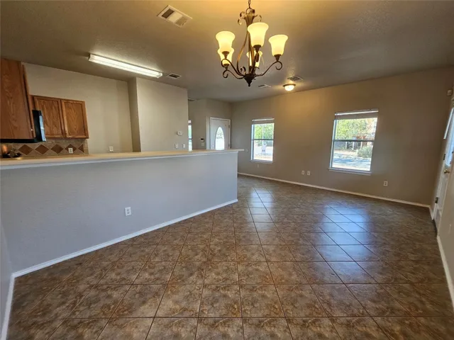 a view of a livingroom with a chandelier