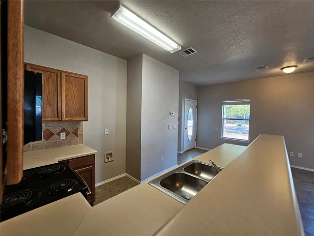 a bedroom with a bed and a mirror