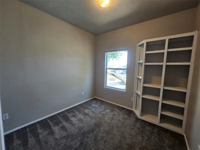 an empty room with closet