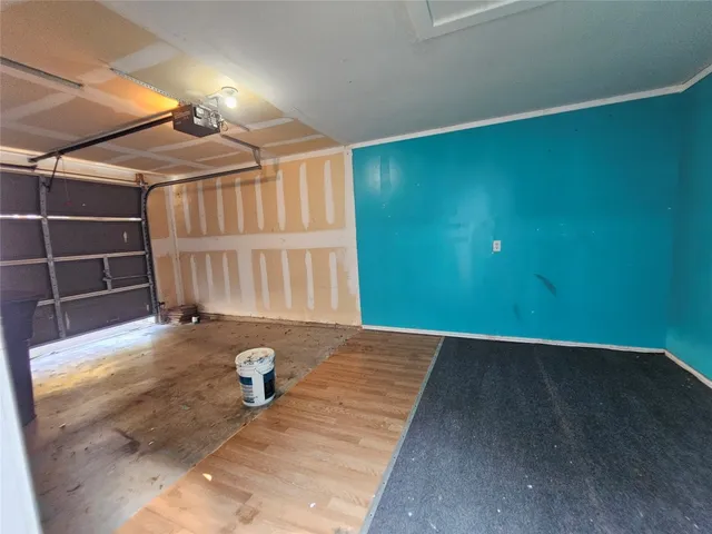 a view of a brick house with a street