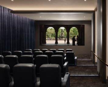 50 West 66th Street, Unit 9C Manhattan, NY 10023 - Photo 29 of 33 a living room with furniture and a large window
