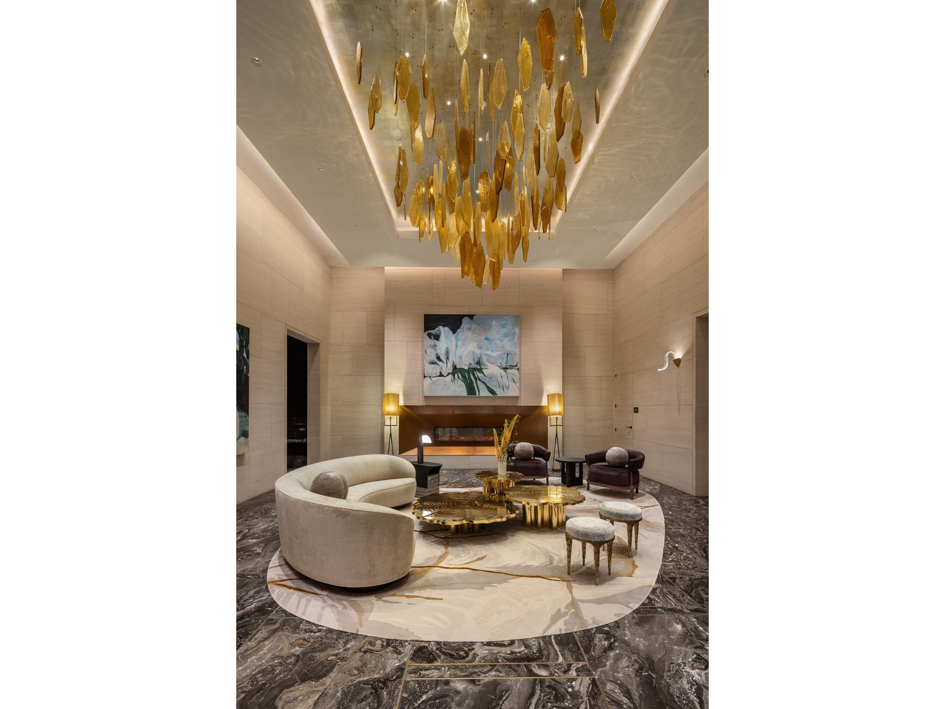 50 West 66th Street, Unit 9C Manhattan, NY 10023 - Photo 5 of 33 a living room with furniture and a chandelier