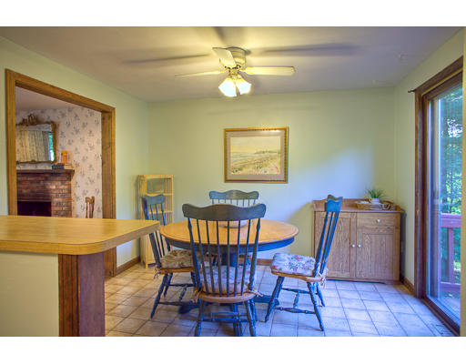 118 Crooked Spring Road Chelmsford, MA 01863 - Photo 11 of 13 a view of a dining room with furniture and wooden floor