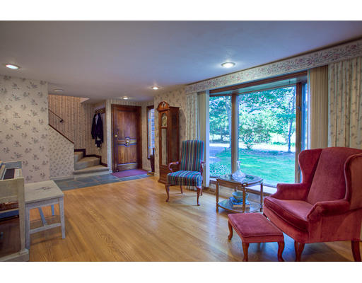 118 Crooked Spring Road Chelmsford, MA 01863 - Photo 3 of 13 a living room with furniture and large windows