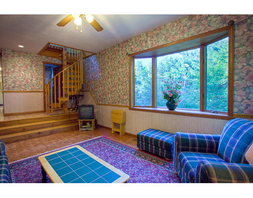 118 Crooked Spring Road Chelmsford, MA 01863 - Photo 6 of 13 a living room with furniture and a window