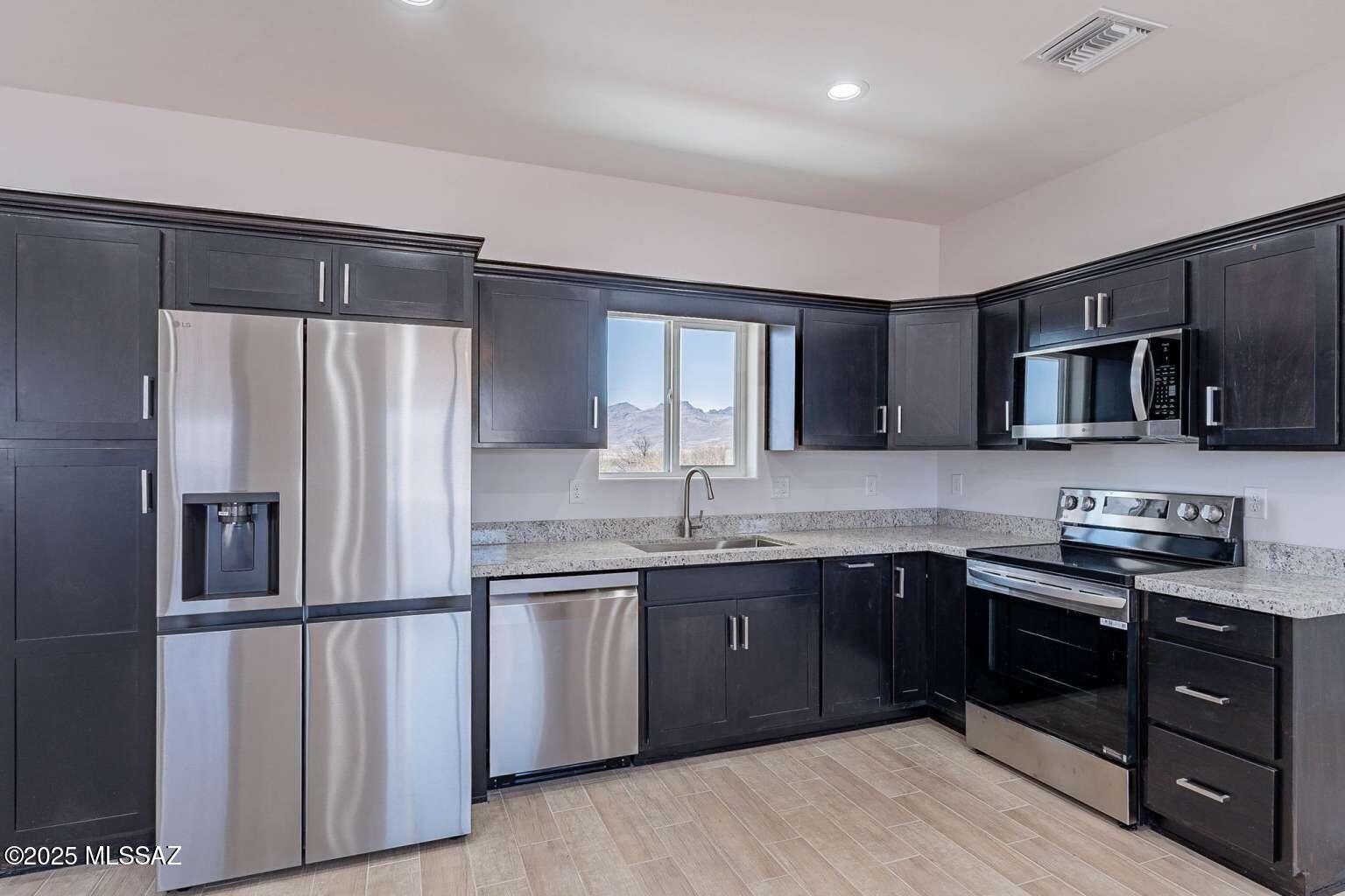 1802 Cajeme Court Rio Rico, AZ 85648 - Photo 6 of 23 Gallery Image 6