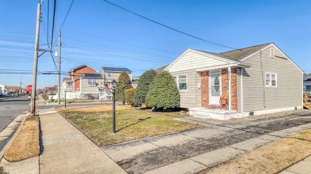 a view of a house with a street