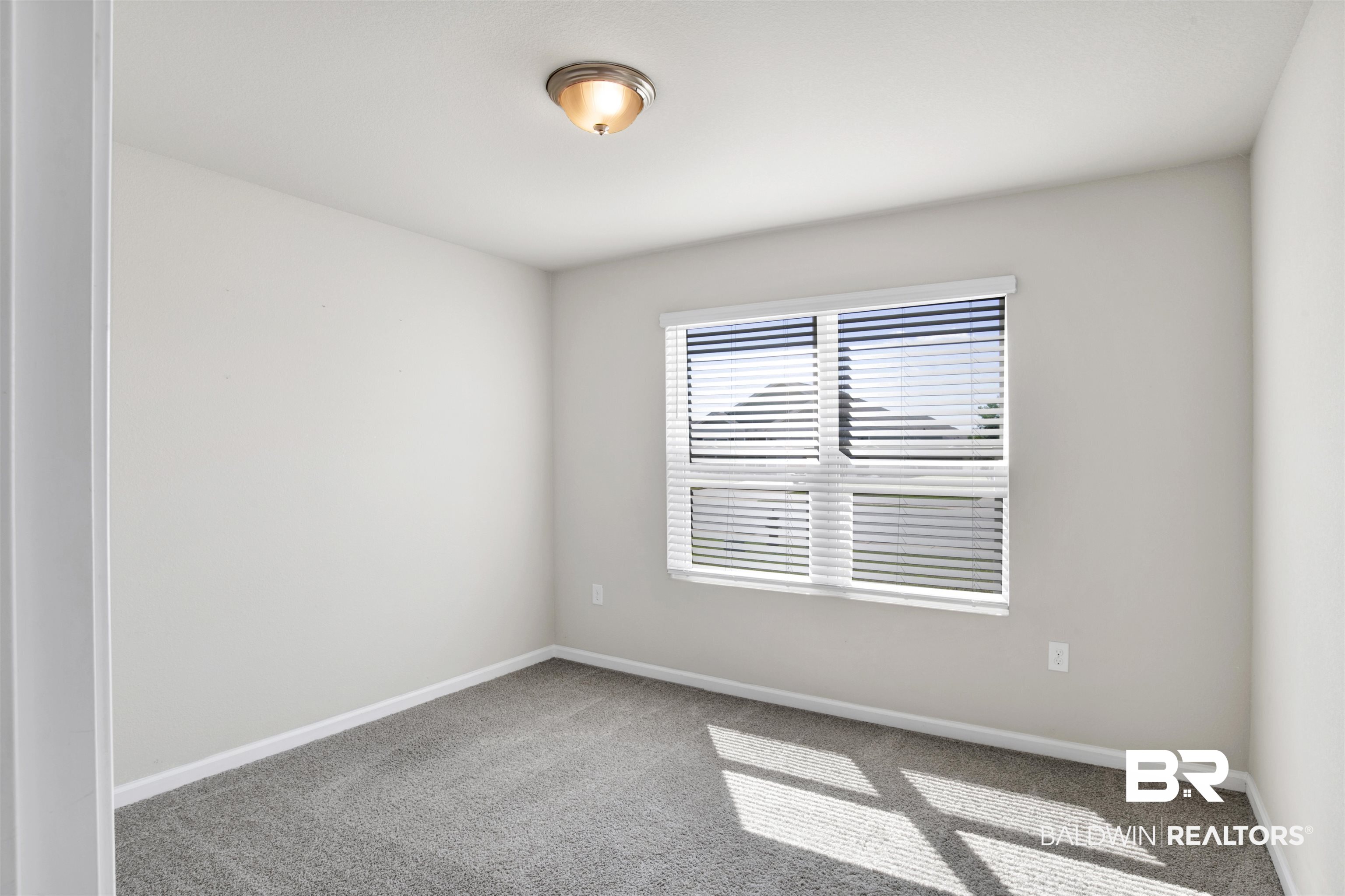 8008 Pickwick Dr. Foley, AL 36535 - Photo 23 of 33 Guest Bedroom