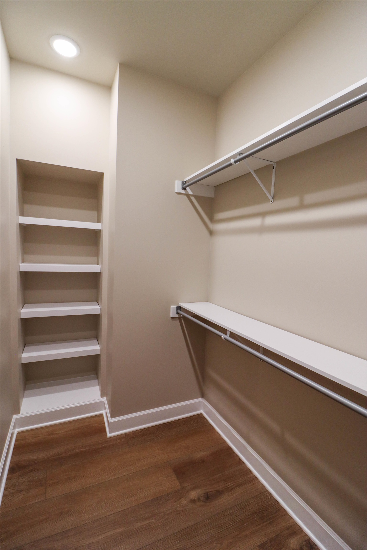 208 Church Street Ripley, TN 38063 - Photo 20 of 33 Walk in closet with luxury Vinyl floors