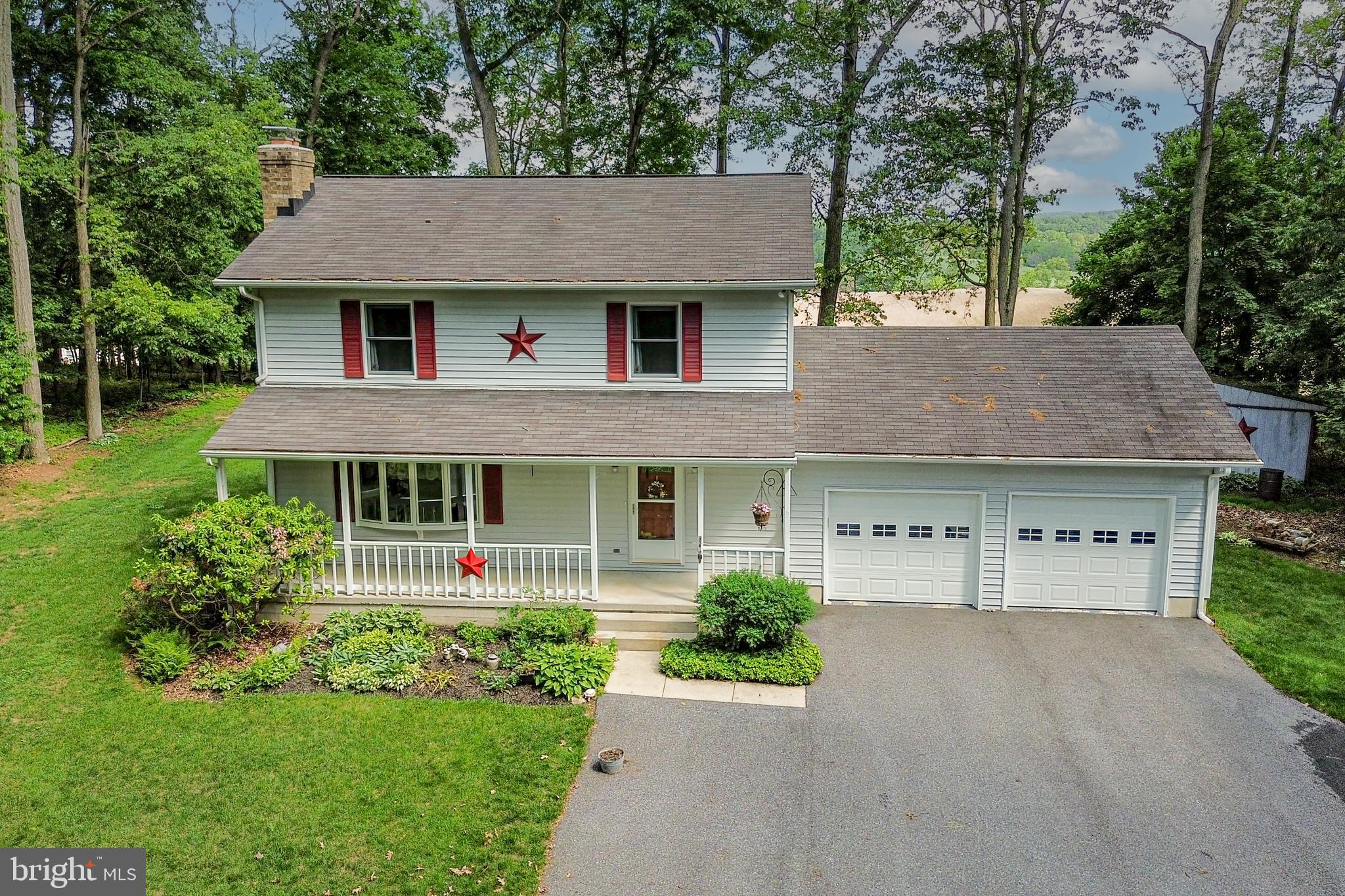 5313 Wentz Road Manchester, MD 21102 - Photo 49 of 51 a house view with a garden space