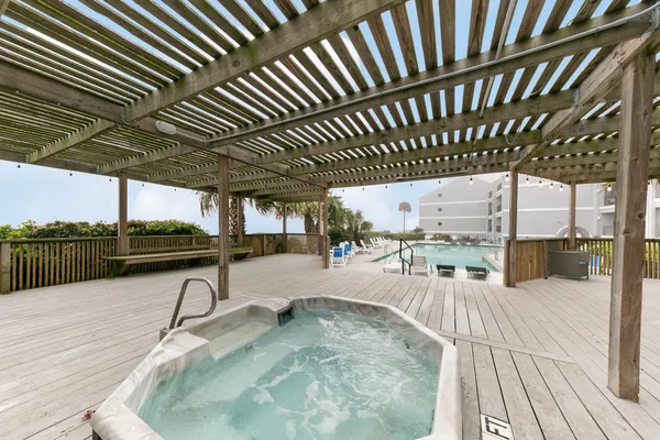 a view of a swimming pool with a patio