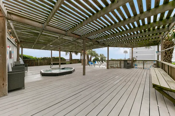 a view of a swimming pool with a patio