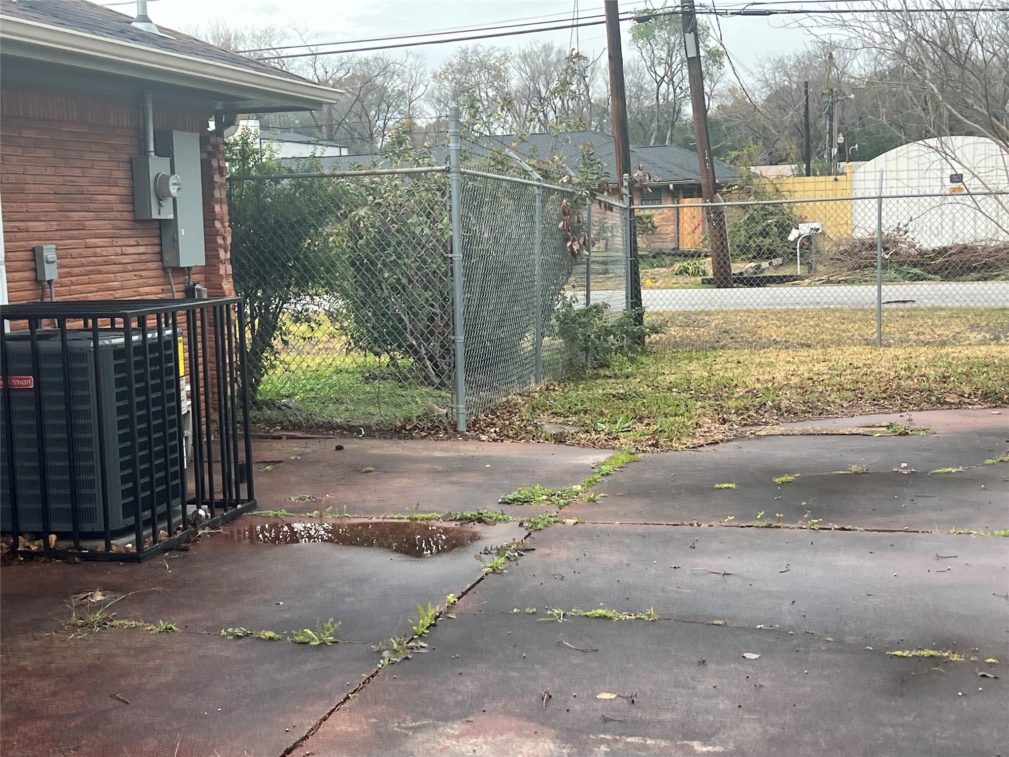 714 East Whitney Street Houston, TX 77022 - Photo 6 of 32 View of the back of the house where there is concrete.