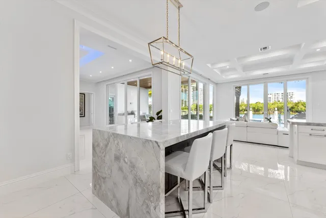 a view of an empty walk in closet with wooden floor