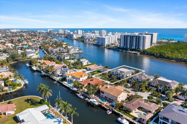 a kitchen with white cabinets and a sink