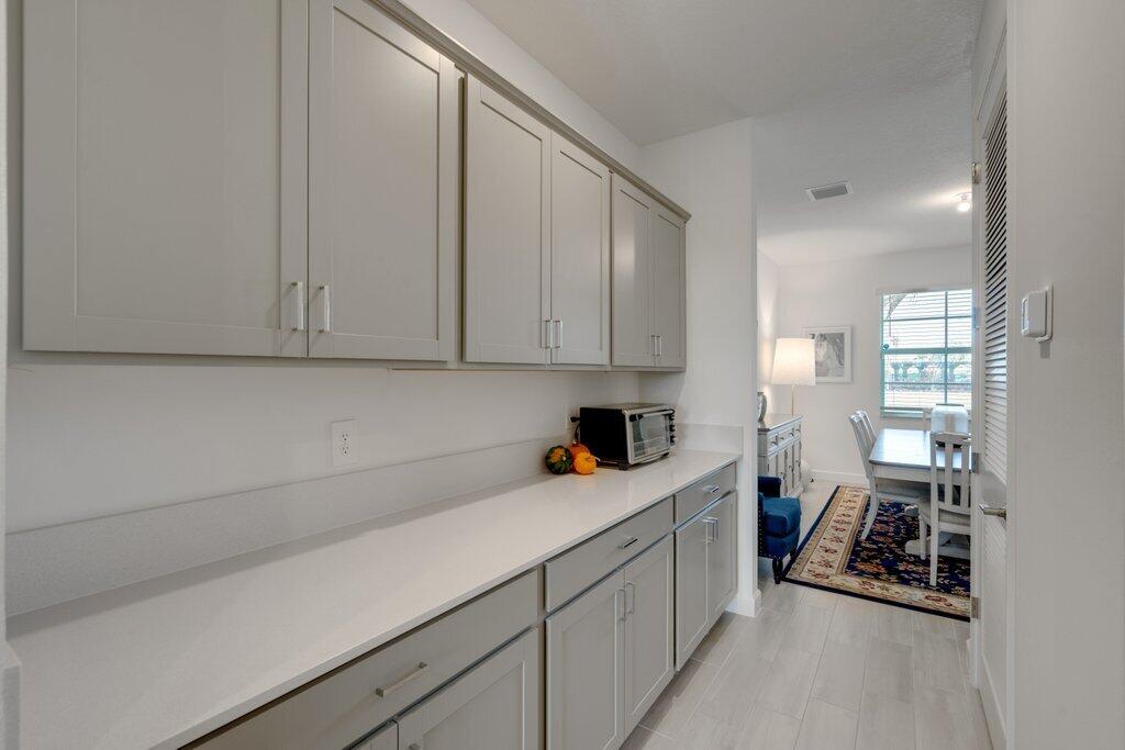 12328 Southwest Roma Circle Port St. Lucie, FL 34987 - Photo 12 of 72 Pantry to Dining.jpg-SMALL