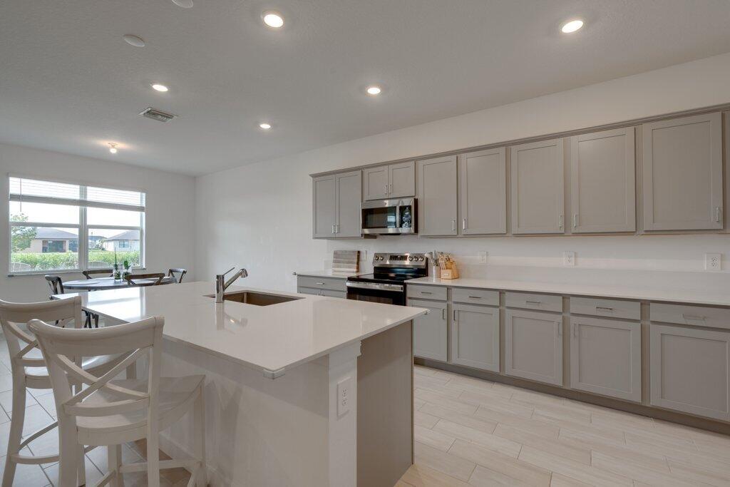 12328 Southwest Roma Circle Port St. Lucie, FL 34987 - Photo 14 of 72 Kitchen L.jpg-SMALL