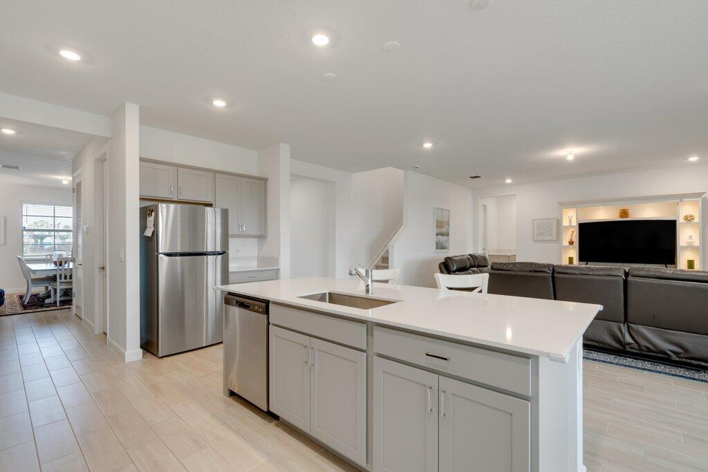 12328 Southwest Roma Circle Port St. Lucie, FL 34987 - Photo 16 of 72 Kitchen to Living .jpeg-SMALL