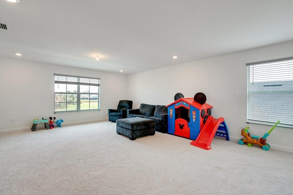 12328 Southwest Roma Circle Port St. Lucie, FL 34987 - Photo 29 of 72 2nd Story Family Room R.jpg-SMALL