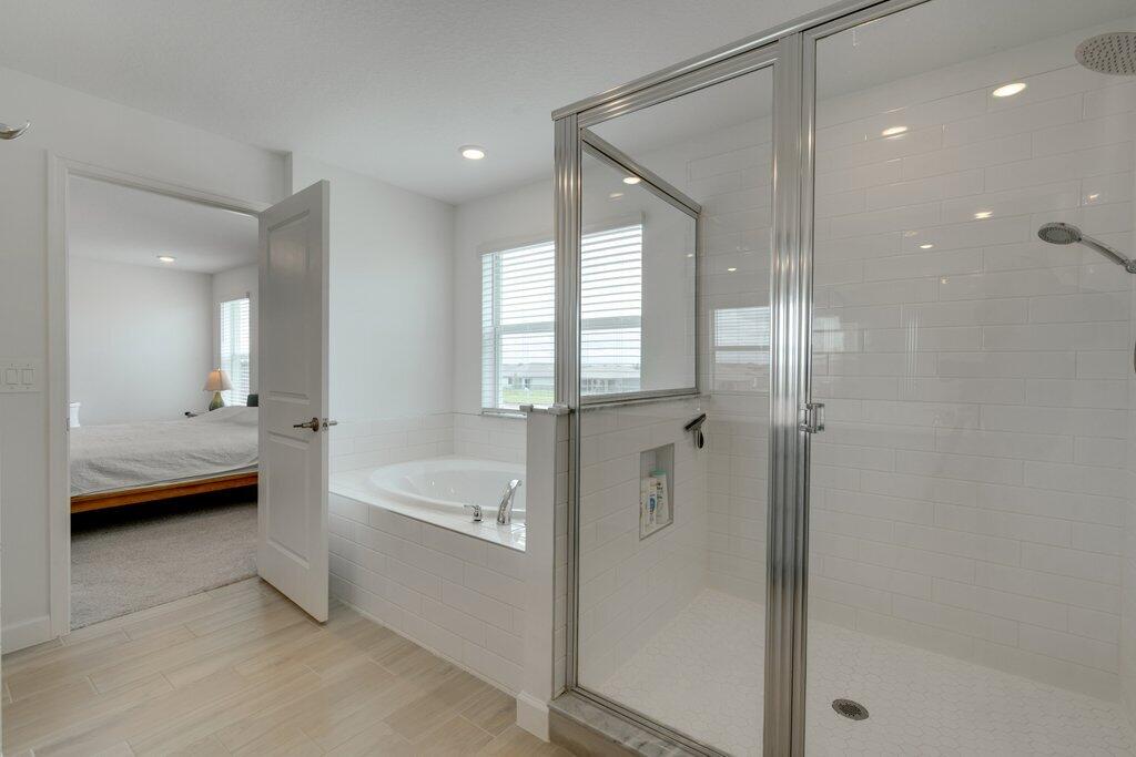 12328 Southwest Roma Circle Port St. Lucie, FL 34987 - Photo 41 of 72 Primary Bathroom Tub.jpg-SMALL