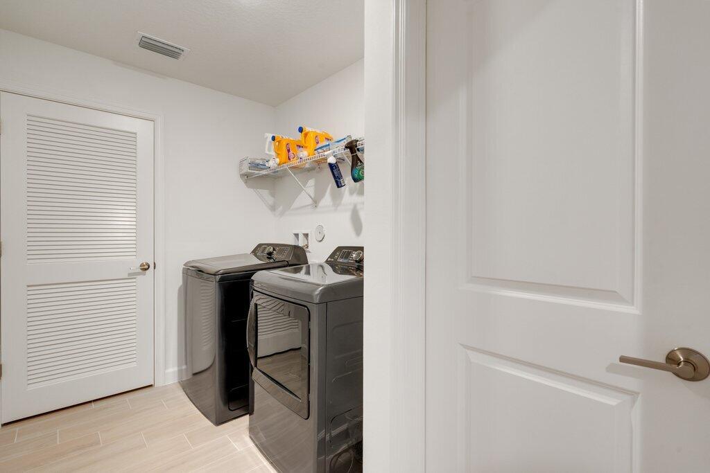 12328 Southwest Roma Circle Port St. Lucie, FL 34987 - Photo 44 of 72 Laundry.jpeg-SMALL