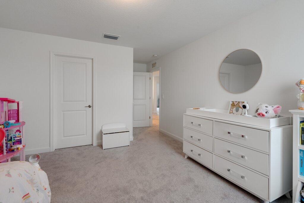 12328 Southwest Roma Circle Port St. Lucie, FL 34987 - Photo 46 of 72 Bedroom 2nd Entry.jpeg-SMALL