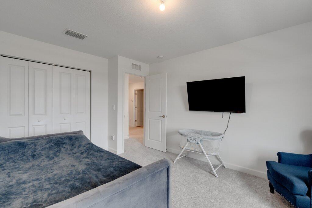 12328 Southwest Roma Circle Port St. Lucie, FL 34987 - Photo 52 of 72 Bedroom 4th to Entry.jpeg-SMALL