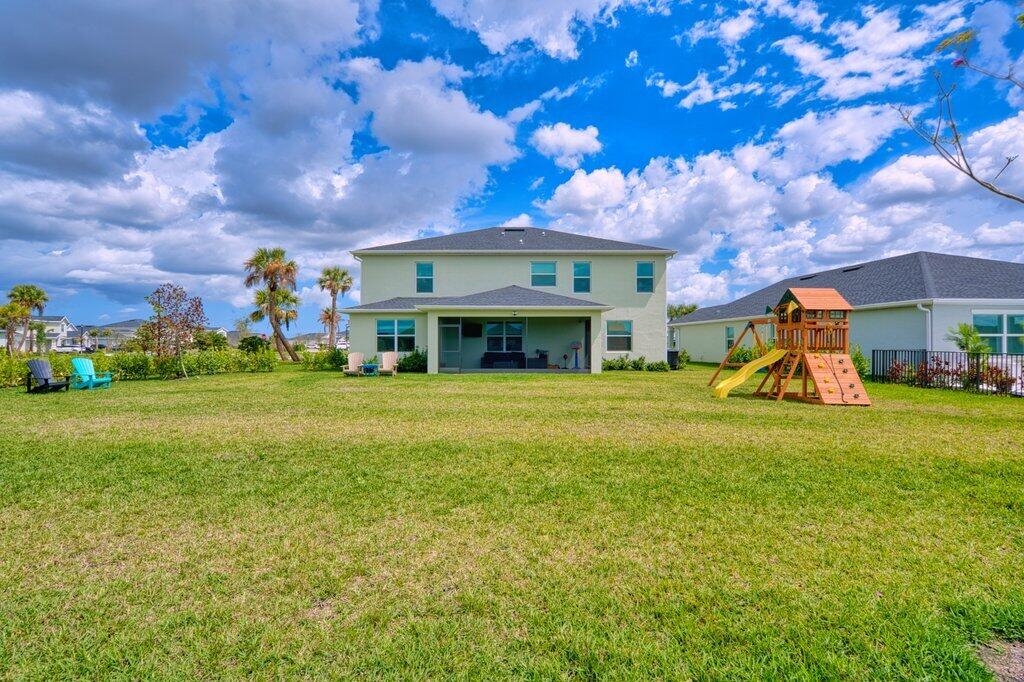 12328 Southwest Roma Circle Port St. Lucie, FL 34987 - Photo 59 of 72 Rear Exterior.jpeg-SMALL
